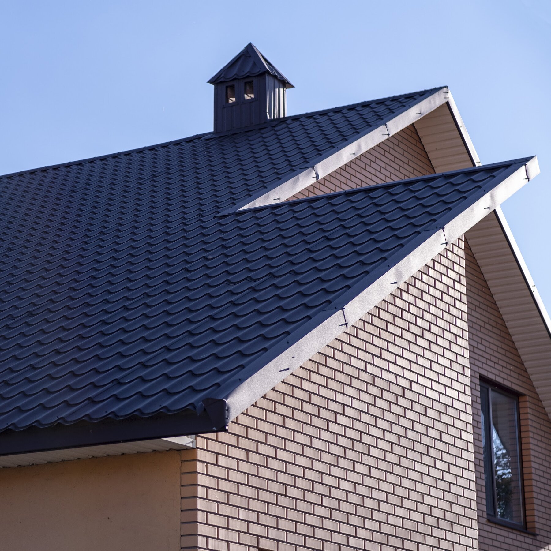Finished metal roof on a home — Affordable Roofing