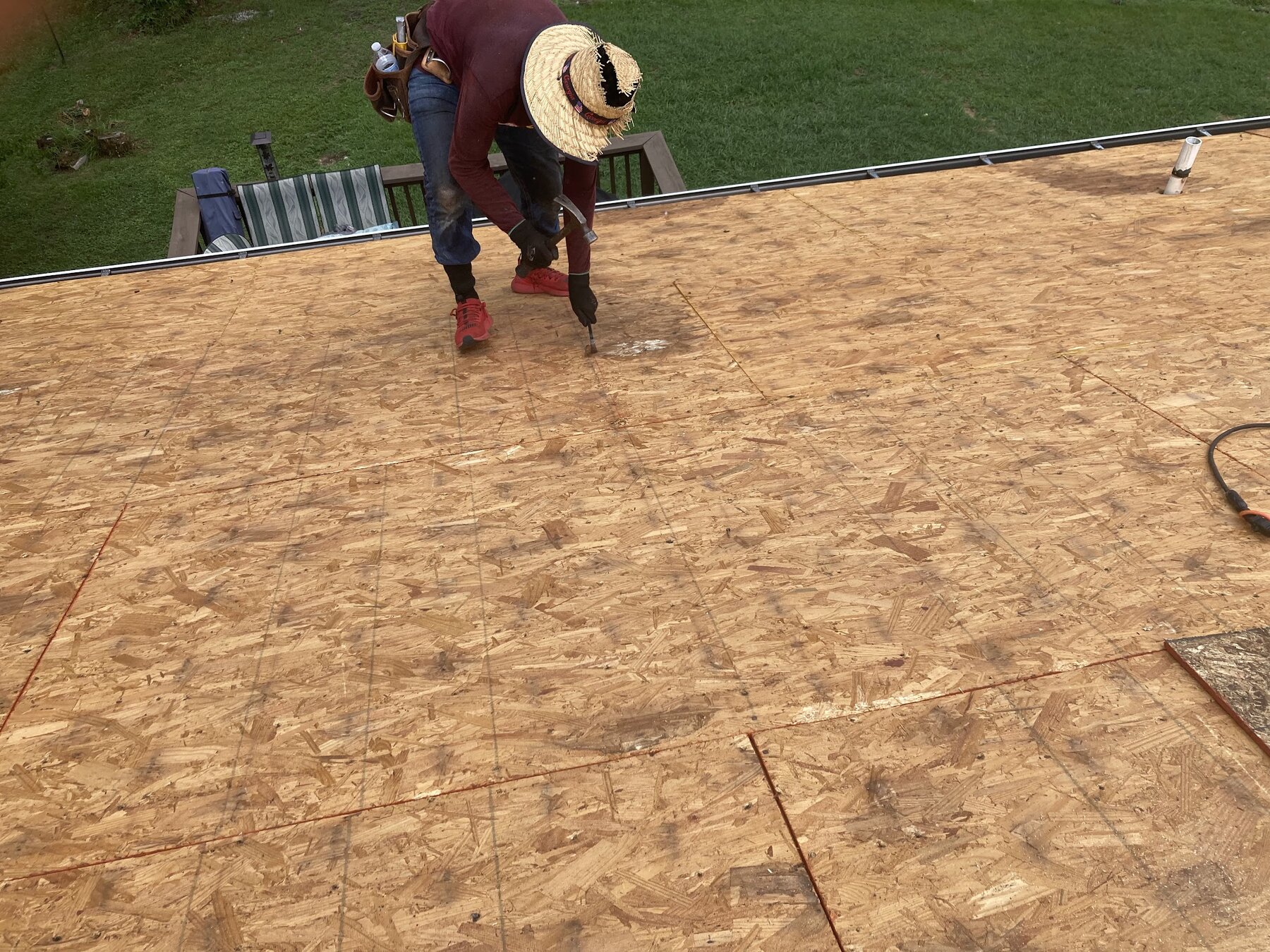Affordable Roofing crew installing new decking